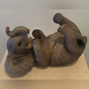 Elephant wine bottle holder made of cast or composite resin. By DWK Corp.